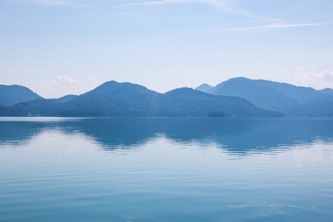 Sayram Lake - Sapphire blue waters reflecting snow-capped peaks