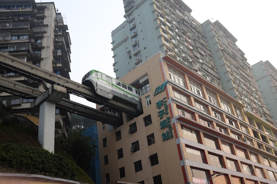Chongqing monorail train passing through a building
