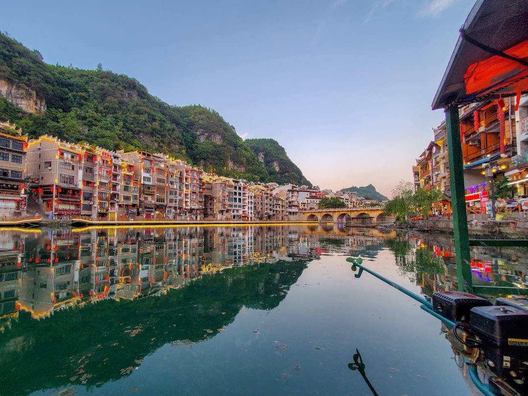 Zhenyuan Ancient Town river reflection at night