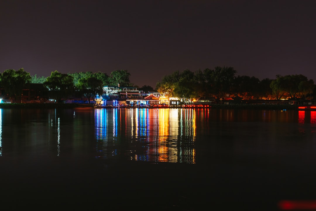 Houhai Lakes district with traditional boats and lantern-lit streets